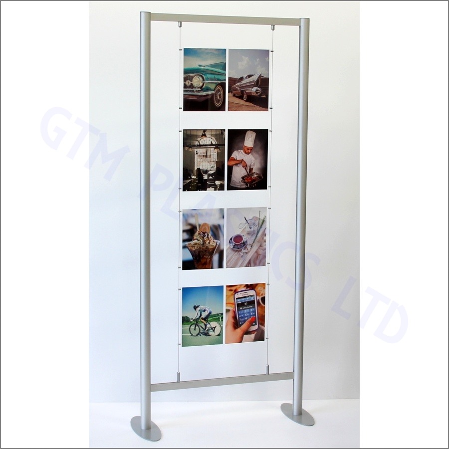 A freestanding 2-metre high anodised aluminium frame, supporting A4 and A3 poster holders suspended between cables that are attached to its crossbars.
