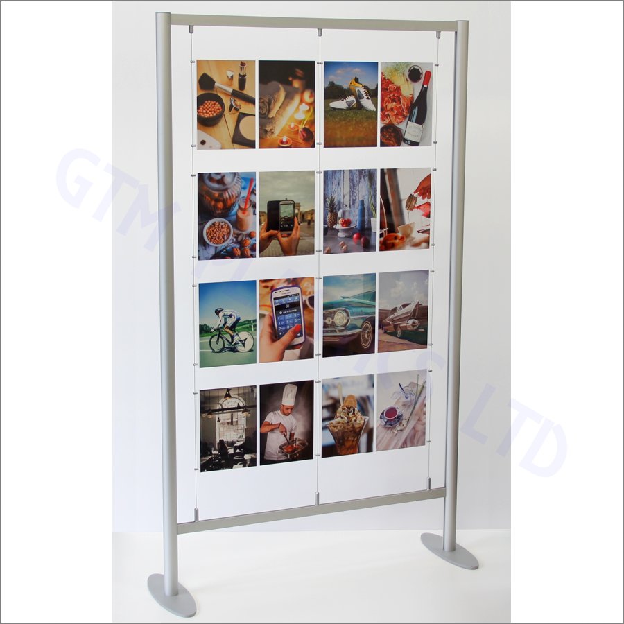 A freestanding 2-metre high anodised aluminium frame, supporting A4 and A3 poster holders suspended between cables that are attached to its crossbars.