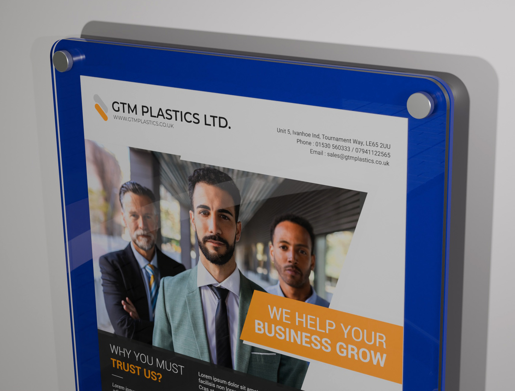 A poster sandwiched between two acrylic panels. The rear panel is opaque blue. The photo is zoomed in to show the rounded corners closeup.